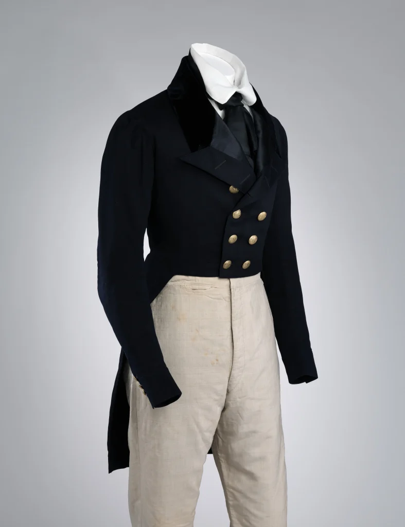 Black British tailcoat from 1840–50 with a short front and long split tails at the back.