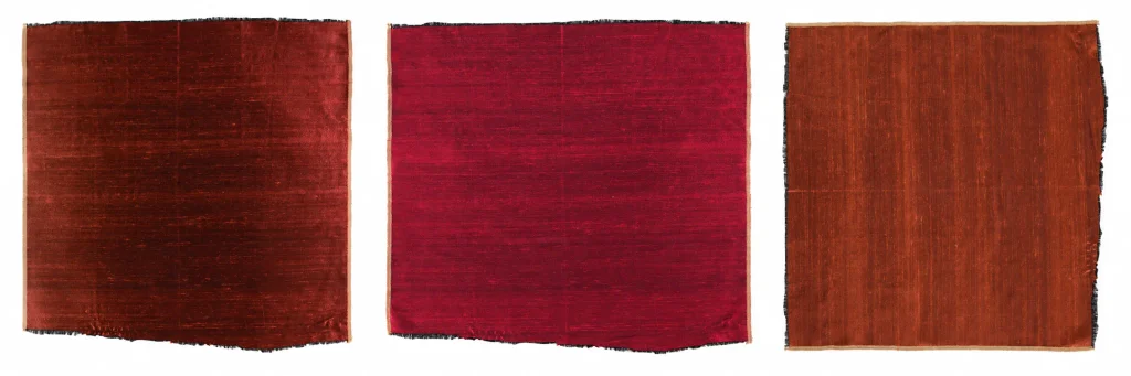 Three photographs of the same red-orange changeable silk textile woven with a black warp and red weft.
