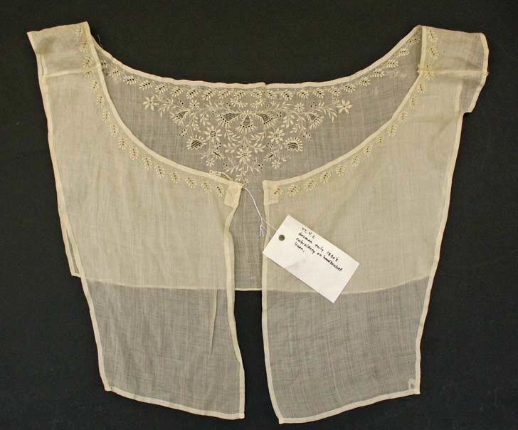 Early-1830s white linen chemisette with a wide neckline and white embroidery.