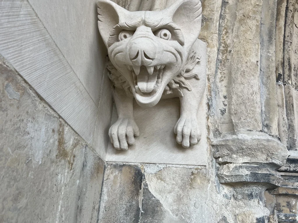 New stone grotesque depicting a pine marten, carved for Canterbury Cathedral's west front.